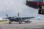 KA114 on the apron with the Canadian Warplane Heritage Museum's lancaster's nose at the top-right of the image.