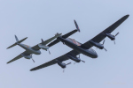 Mosquito and Lancaster in formation.