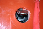 The external part of the periscopic drift sight. A spring-loaded flap would normally have been in place over the hole in the fuselage until the drift wight was used.