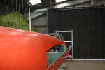 View along the starboard side of the fuselage looking forwards.