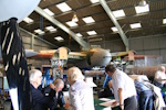 TA122 in the background of the Pathfinder signing event as restoration work continues.