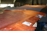 Looking along the top of the port wing towards the fuselage from the outboard flap location.