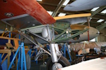 TA122's starboard engine bearer and undercarriage with the side of the fuselage visible beyond.