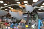 Closer view of TA122 from the front port quarter. Note installed machine guns in the nose and single-stage Merlin engines.