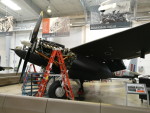 View of TV959 from underneath the leading edge of the port wing. Note the access panels removed from the under surface of the wing and the registration 
        NS838 on the rear of the fuselage