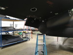 Closeup view of the underside of the starboard outboard wing section and flap